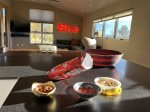 Snacks in the kitchen with the living area within view